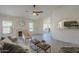 A living room boasts neutral colors, fireplace, and an archway at 4248 E Jason Dr, Phoenix, AZ 85050