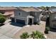 Spacious two-story home with desert landscaping and a private driveway at 4285 E Rousay Dr, San Tan Valley, AZ 85140