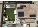 Aerial view of backyard including patio and solar panels on the roof at 4285 E Rousay Dr, San Tan Valley, AZ 85140