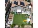 Well-maintained backyard with artificial turf, play structure, and outdoor seating at 4285 E Rousay Dr, San Tan Valley, AZ 85140