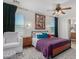 Comfortable bedroom with white walls, wood accents, and stylish decor for a relaxing atmosphere at 4285 E Rousay Dr, San Tan Valley, AZ 85140