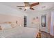Bright bedroom with two-tone walls, walk-in closet, and decorative accents for a cheerful retreat at 4285 E Rousay Dr, San Tan Valley, AZ 85140