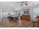 Open-concept dining area flows into a modern kitchen with a large island at 4285 E Rousay Dr, San Tan Valley, AZ 85140