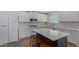 Bright kitchen featuring white cabinets, quartz countertops, and stainless steel appliances at 4285 E Rousay Dr, San Tan Valley, AZ 85140