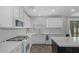 Well-appointed kitchen with stainless steel appliances and herringbone backsplash at 4285 E Rousay Dr, San Tan Valley, AZ 85140