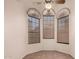 Cozy breakfast nook with tiled floor, bright windows, and modern ceiling fan at 4313 N 29Th Way, Phoenix, AZ 85016