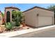 Charming single-level home with stucco exterior, a two-car garage and a decorative tiled front courtyard gate at 4313 N 29Th Way, Phoenix, AZ 85016