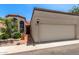 Charming single-level home with stucco exterior, a two-car garage and a decorative tiled front courtyard gate at 4313 N 29Th Way, Phoenix, AZ 85016