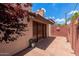 Enclosed patio with red brick pavers and double doors into the house at 4313 N 29Th Way, Phoenix, AZ 85016