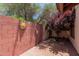 This red brick patio features a decorative brick wall and mature landscaping at 4313 N 29Th Way, Phoenix, AZ 85016