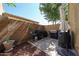 The backyard features a grilling area and desert landscaping at 451 S Hawes Rd # 53, Mesa, AZ 85208