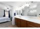 Bright bathroom featuring a large vanity with access to Primary bedroom at 451 S Hawes Rd # 53, Mesa, AZ 85208