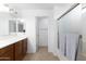 Bathroom showcasing a single sink vanity, shower and tile floors at 451 S Hawes Rd # 53, Mesa, AZ 85208