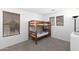 Cozy bedroom with a bunk bed and ample natural light, creating a warm and inviting atmosphere at 451 S Hawes Rd # 53, Mesa, AZ 85208