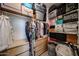Walk in closet featuring built in shelving and ample storage at 451 S Hawes Rd # 53, Mesa, AZ 85208