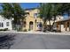 Charming two-story home with an inviting entryway and mature trees shading the front at 451 S Hawes Rd # 53, Mesa, AZ 85208