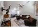 Spacious living area with sofa, a dining table, and open floor plan at 451 S Hawes Rd # 53, Mesa, AZ 85208