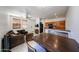 Spacious open-concept living room and kitchen with tile floors and comfortable seating at 451 S Hawes Rd # 53, Mesa, AZ 85208