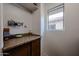 Dedicated work room with countertop and shelving for tools and project supplies at 451 S Hawes Rd # 53, Mesa, AZ 85208
