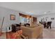 Inviting living room with hardwood floors, comfortable seating, and seamless access to the dining area at 5402 E Mckellips Rd # 237, Mesa, AZ 85215
