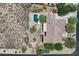 Overhead view of a private home with a swimming pool and xeriscaped surroundings at 5832 E Bent Tree Dr, Scottsdale, AZ 85266