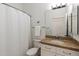Clean bathroom featuring a shower-tub combination, toilet, and vanity at 5832 E Bent Tree Dr, Scottsdale, AZ 85266
