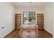 Bright office space with built-in bookshelves and an outdoor view at 5832 E Bent Tree Dr, Scottsdale, AZ 85266