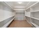 Well-organized walk-in closet with shelving and storage at 5832 E Bent Tree Dr, Scottsdale, AZ 85266
