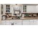 Kitchen sink featuring granite countertops and white cabinets at 618 E Manzanita Pl, Phoenix, AZ 85020