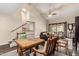 Open concept living and dining area with hardwood floors and natural light at 618 E Manzanita Pl, Phoenix, AZ 85020