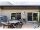 Outdoor patio area with outdoor seating, slider doors and a hot tub at 618 E Manzanita Pl, Phoenix, AZ 85020