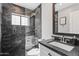 Modern bathroom boasts a glass shower and marble accents at 6721 N 14Th Pl, Phoenix, AZ 85014