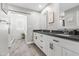 A spacious main bathroom features dual vanities and an ensuite bathroom with a tub and shower at 6721 N 14Th Pl, Phoenix, AZ 85014