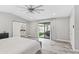 This bright main bedroom offers a sliding glass door to the yard and an ensuite bathroom at 6721 N 14Th Pl, Phoenix, AZ 85014