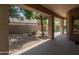 Backyard with desert landscaping, patio, and a freeform pool at 6917 E Night Glow Cir, Scottsdale, AZ 85266