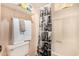 Clean bathroom with a shower-tub combo, stylish curtain, and organized towel shelves at 839 S Westwood -- # 287, Mesa, AZ 85210