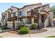 Inviting townhouse with private balcony, tile roof, well-manicured front yard and stone accents at 839 S Westwood -- # 287, Mesa, AZ 85210
