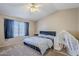 Bedroom featuring a gray bed, vaulted ceiling, and a play tent at 869 W Shellfish Dr, Gilbert, AZ 85233