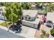 Attractive two-story home with a neutral facade, manicured landscaping, and a spacious driveway at 869 W Shellfish Dr, Gilbert, AZ 85233