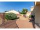 Backyard with brick patio and low-maintenance landscaping at 9121 E Karen Dr, Scottsdale, AZ 85260