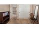 Bedroom with carpet, shelving, and sliding closet doors at 9121 E Karen Dr, Scottsdale, AZ 85260