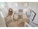 Bright living room with a high ceiling, light walls, hardwood floors and two sofas at 10490 E Morning Star Dr, Scottsdale, AZ 85255