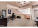Versatile loft space with neutral carpet and natural lighting at 1121 W Windjammer Dr, Gilbert, AZ 85233