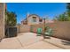 Inviting patio space showcasing well-maintained hardscape and decorative seating arrangement at 1121 W Windjammer Dr, Gilbert, AZ 85233