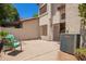 Relaxing outdoor patio with lush greenery and a comfortable seating area at 1121 W Windjammer Dr, Gilbert, AZ 85233