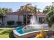 Beautiful landscaping surrounds the community clubhouse with lush landscaping and decorative fountain at 11375 E Sahuaro Dr # 2015, Scottsdale, AZ 85259
