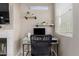 Bright desk area with shelving, perfect for a home office, near a window at 11375 E Sahuaro Dr # 2015, Scottsdale, AZ 85259