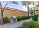 Outdoor grill and landscaped area, ideal for outdoor cooking and entertaining friends at 11375 E Sahuaro Dr # 2015, Scottsdale, AZ 85259