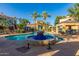 Gorgeous community pool area with decorative fountain, cabana, and plenty of seating at 11375 E Sahuaro Dr # 2015, Scottsdale, AZ 85259