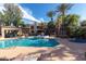 Inviting community pool offers ample lounge seating and relaxing water features at 11375 E Sahuaro Dr # 2015, Scottsdale, AZ 85259